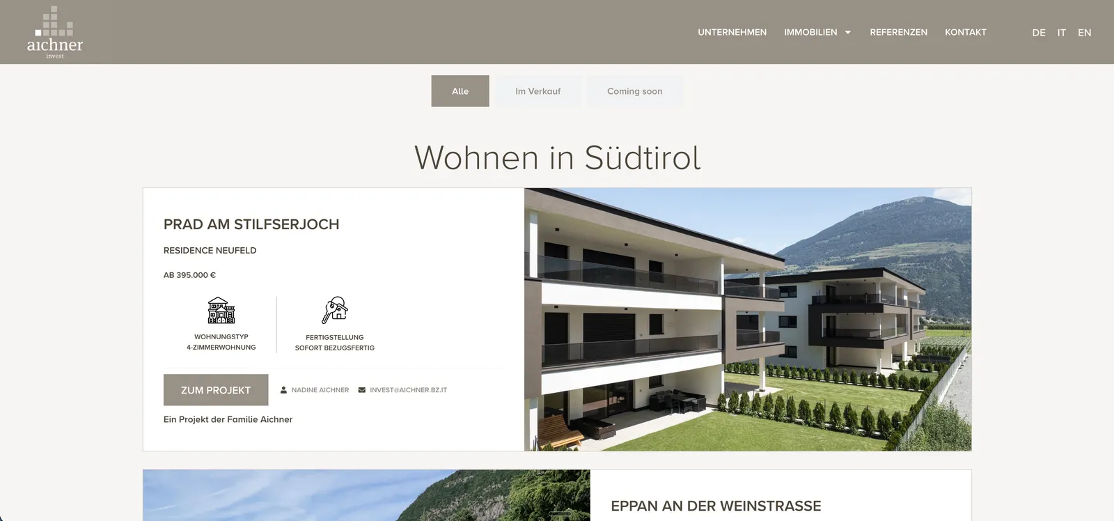Kategorie-Seite mit Immobilien-Übersicht und Status-Filter von Aichner Invest